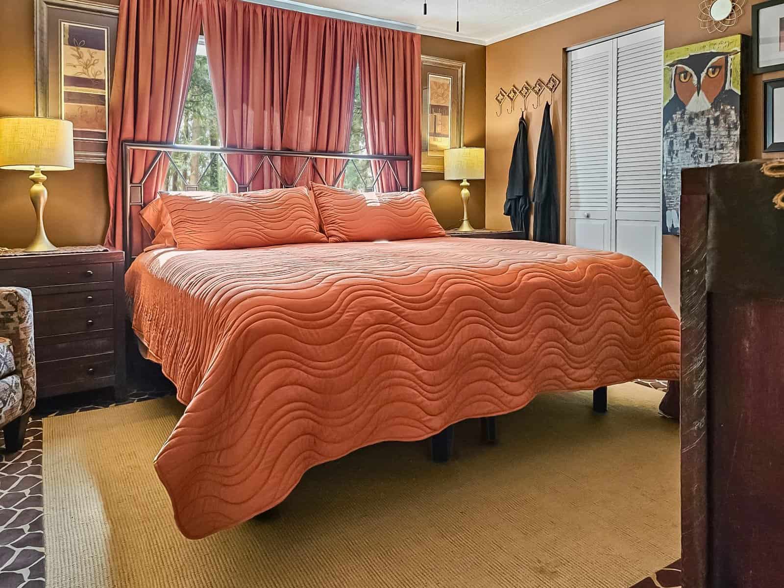 Bedroom with king bed and closet in the Concrete, WA rent-to-own manufactured home