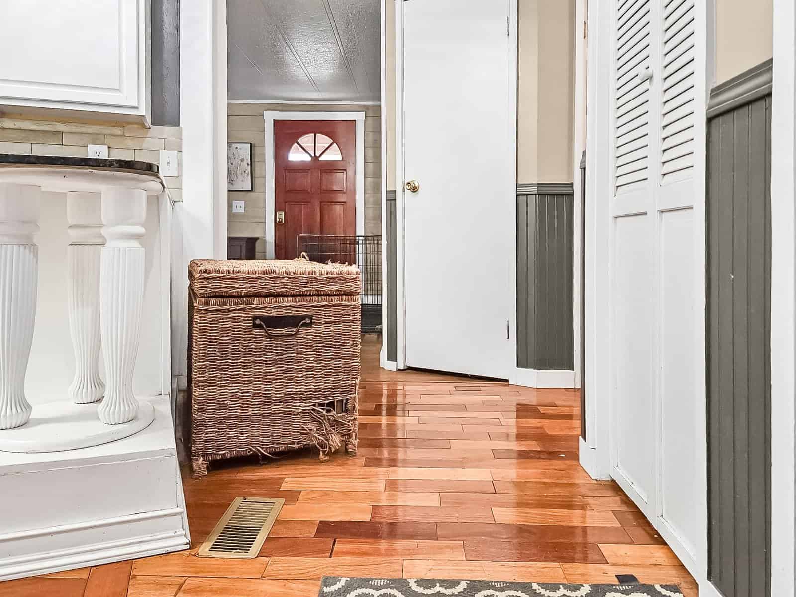 Hallway with wood flooring and front door at the Concrete, WA rent-to-own home on Baker Loop Road