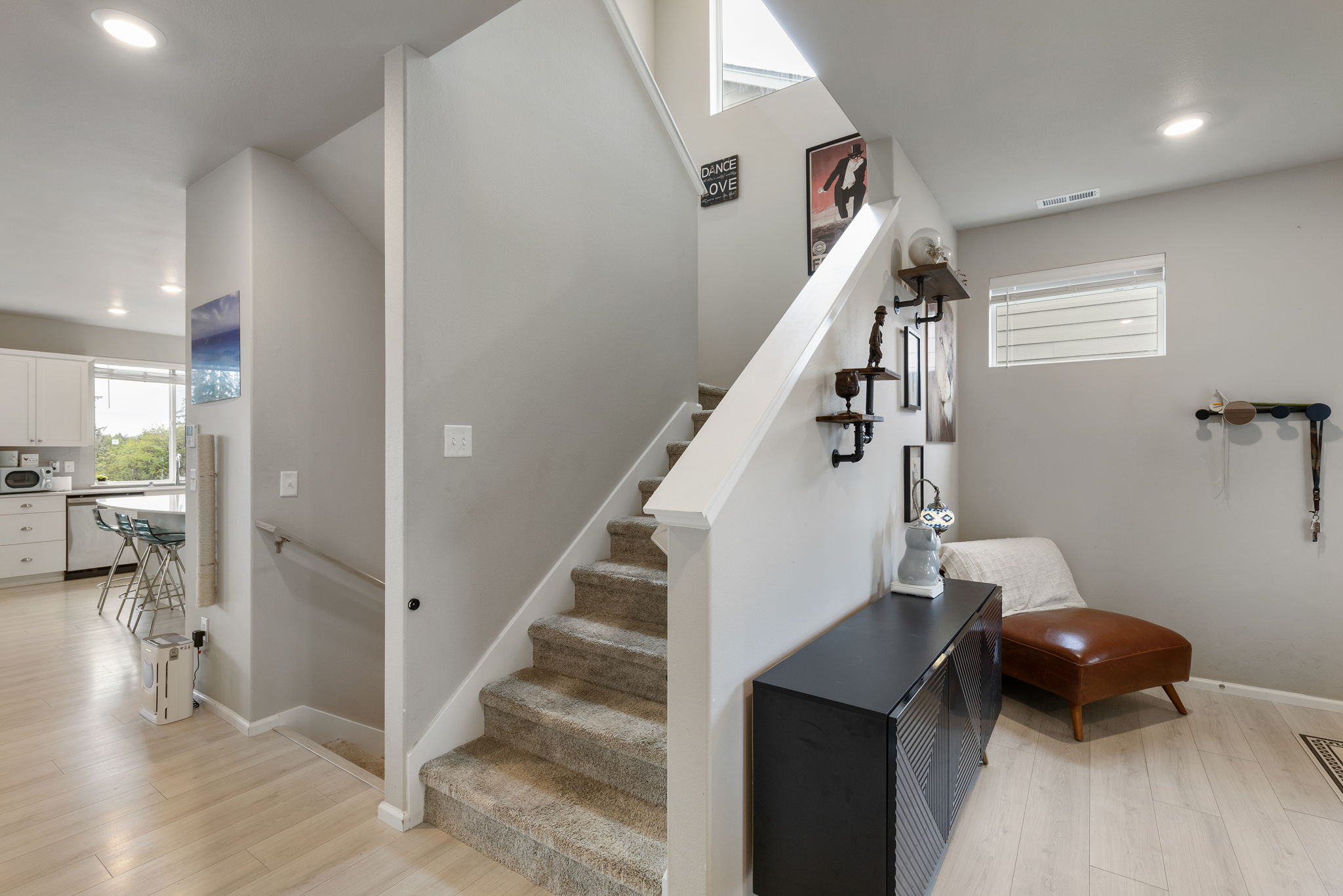 Staircase leading to basement suite and upper floor in the Port Orchard rent-to-own home