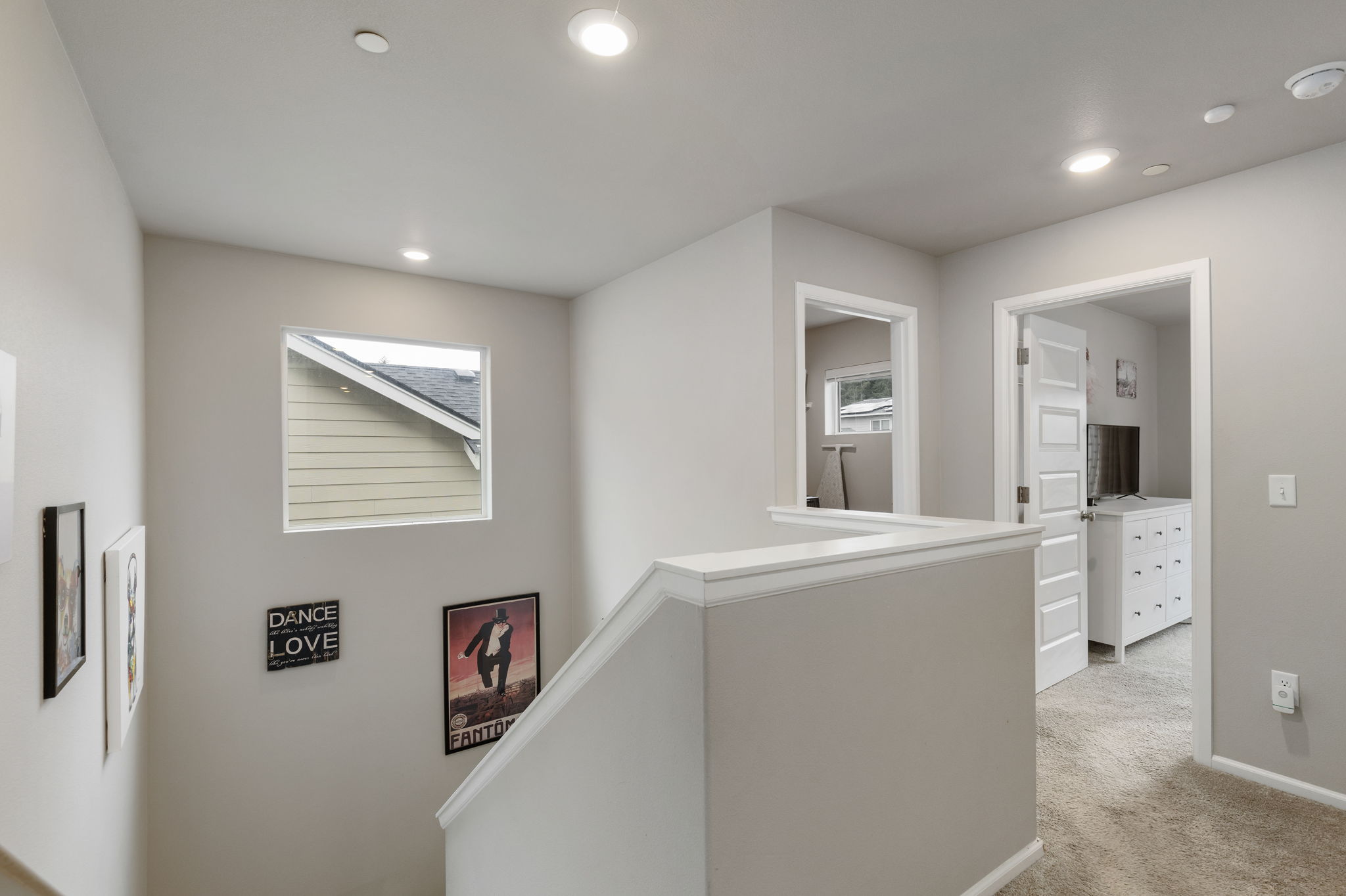 Upstairs hallway and landing with bedroom access in the Port Orchard rent-to-own home at 962 Thrush Ct SE