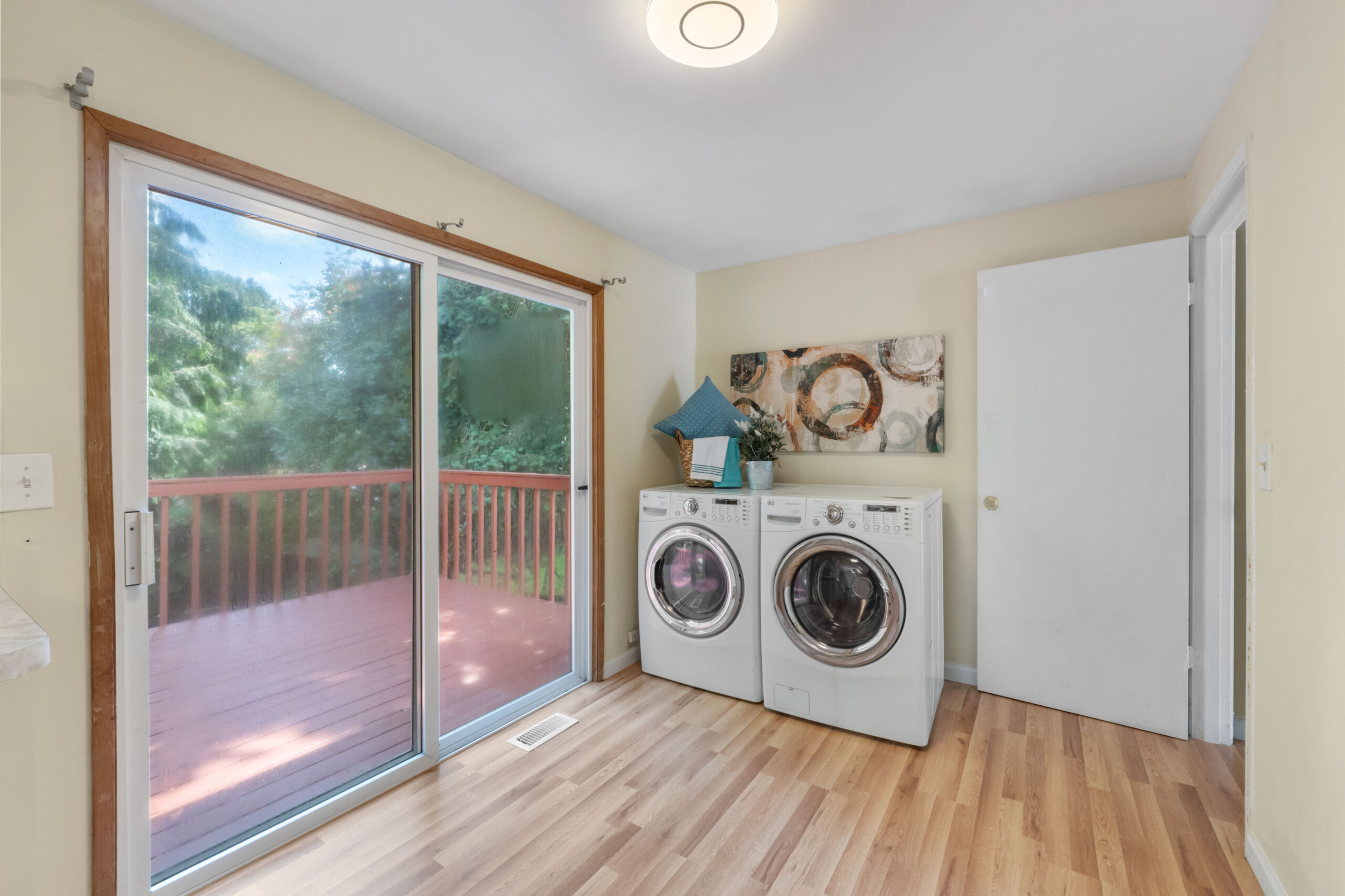 Laundry area with washer/dryer and slider to the deck, Auburn duplex home